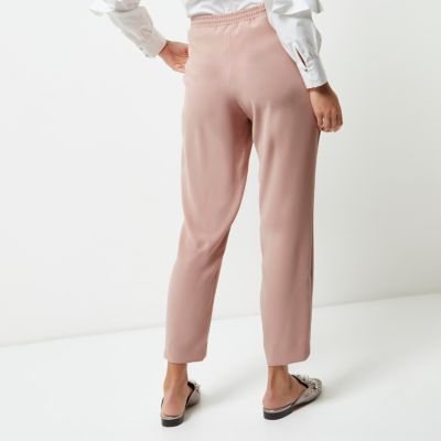 Light pink tie waist tapered trousers